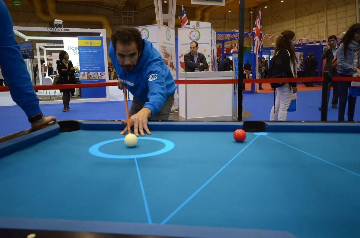 A player lining up a shot over the projected aiming guides