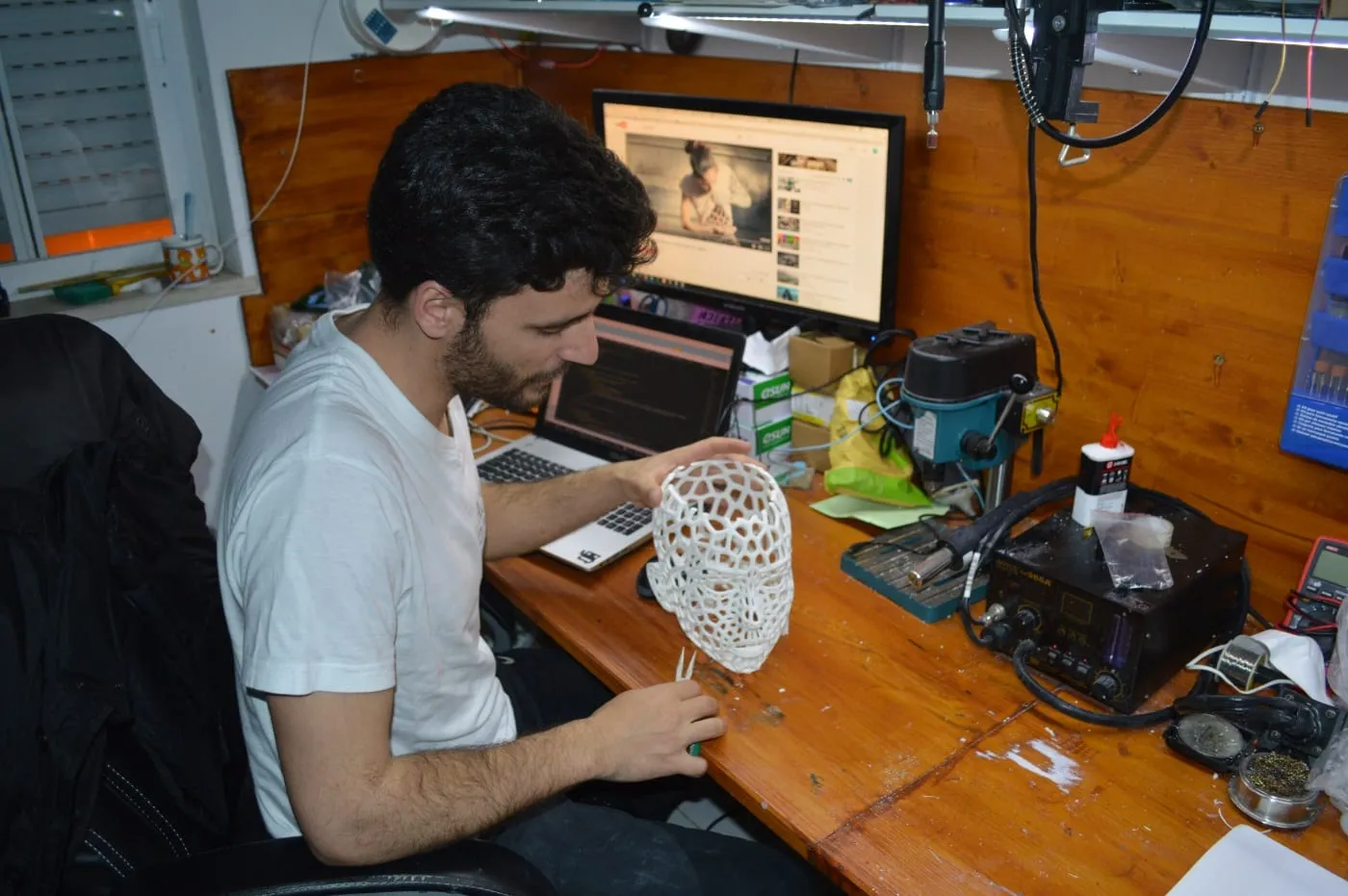 Working on the printed head at the desk