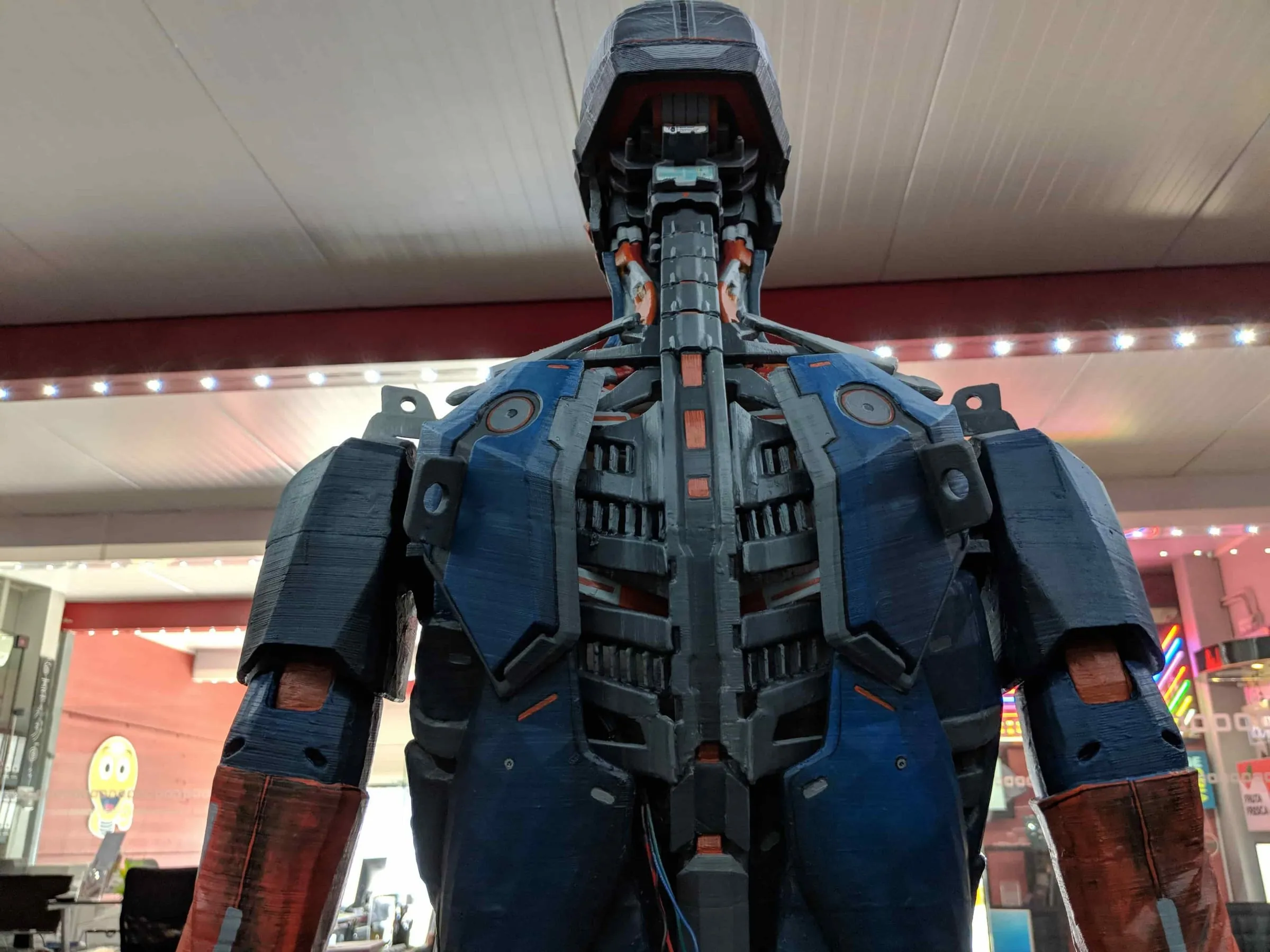 Adam's back with the exposed spine and armour plates