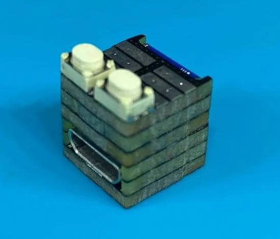 Close-up of the stacked PCBs and buttons